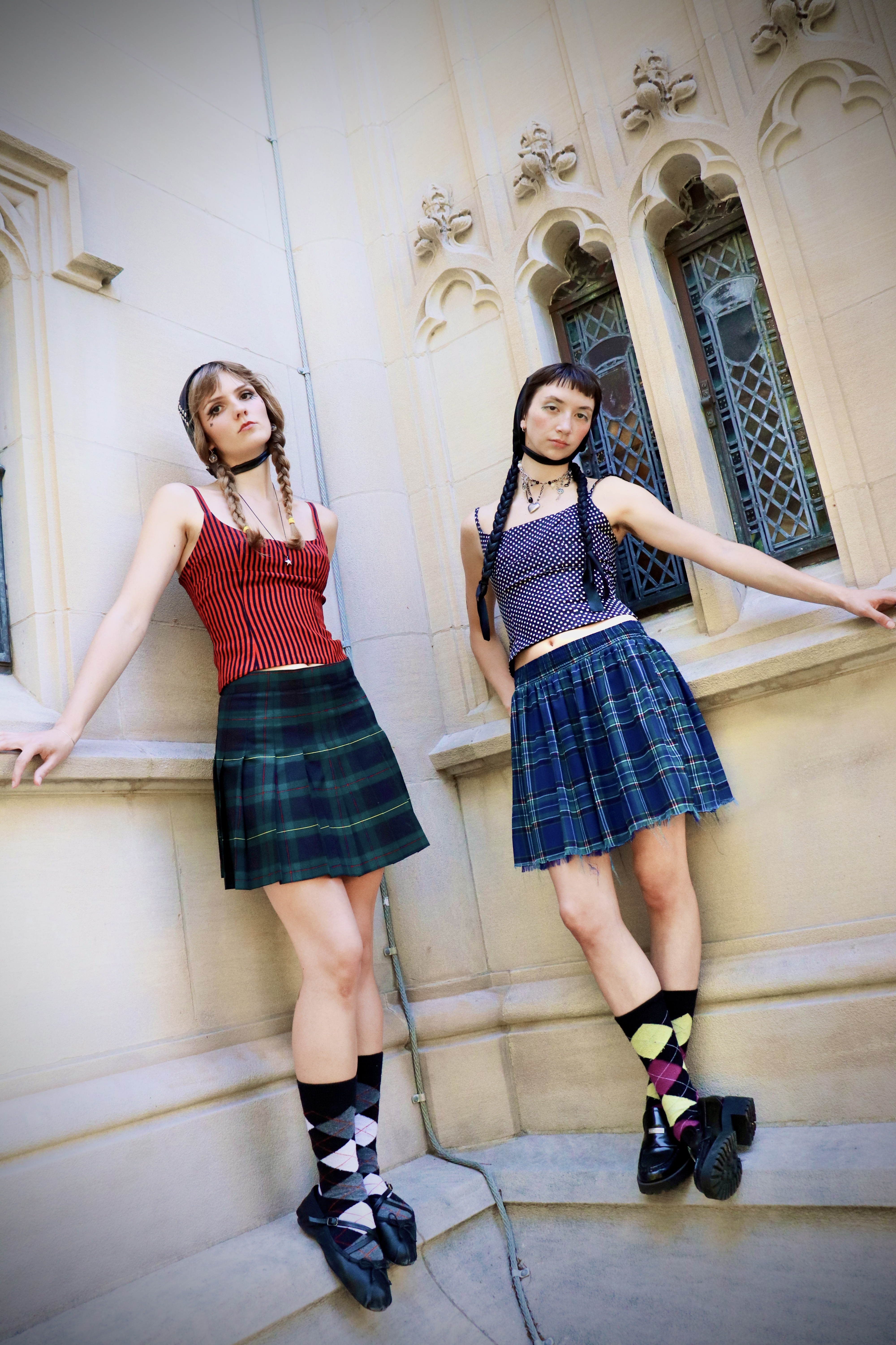 Kasey Johnson laughing beside racks of Sour Dice garments